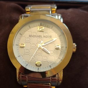 Michael Kors gold watch with MK logos
